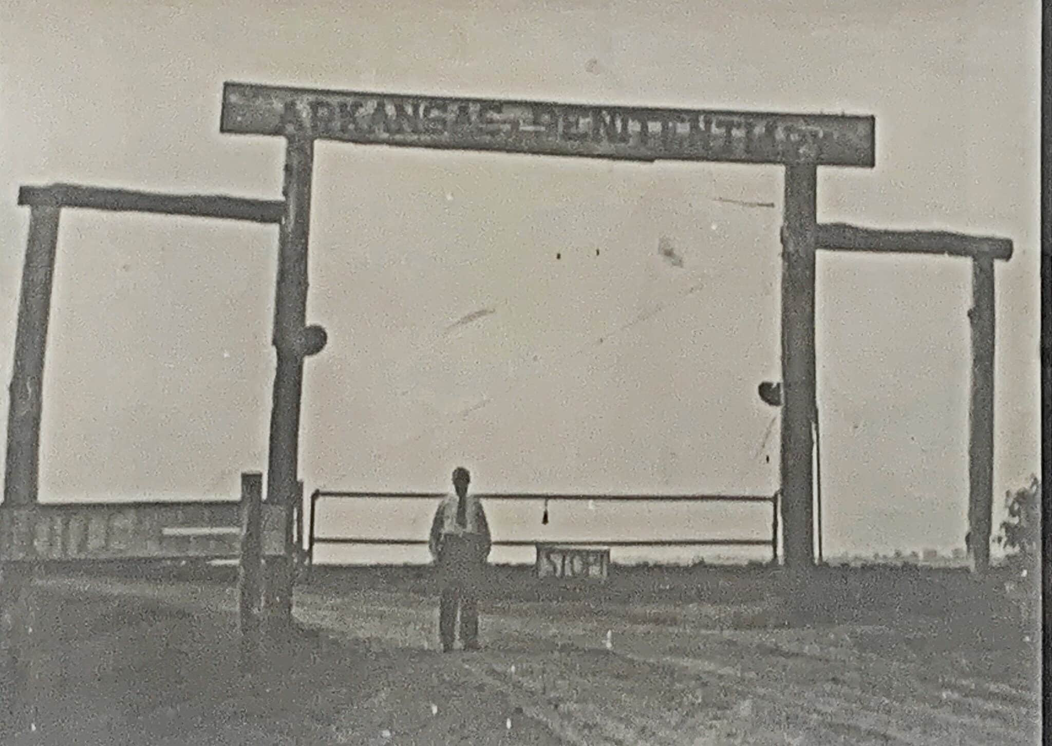 Warden Tom Cogbill at Cummins Front Gate - 1930s