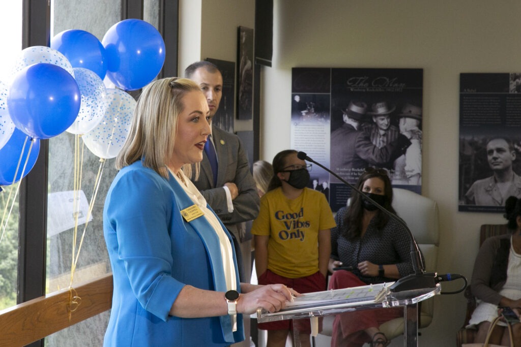 Woman speaking at podium